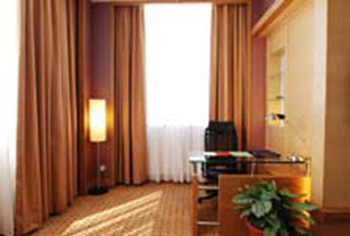 Imagen de los interiores del Hotel New World Suites. Foto 12