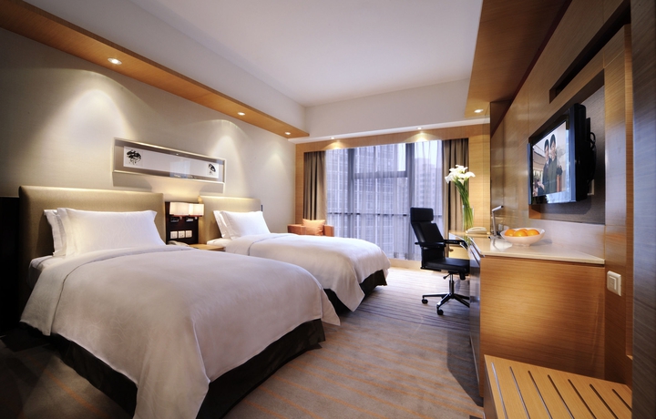 Imagen de la habitación del Hotel New World Wuhan. Foto 5
