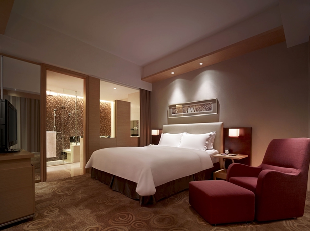Imagen de la habitación del Hotel New World Wuhan. Foto 6