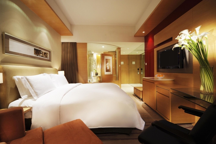 Imagen de la habitación del Hotel New World Wuhan. Foto 8