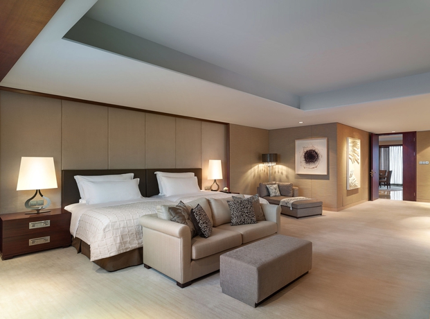 Imagen de la habitación del Hotel New World Wuhan. Foto 9