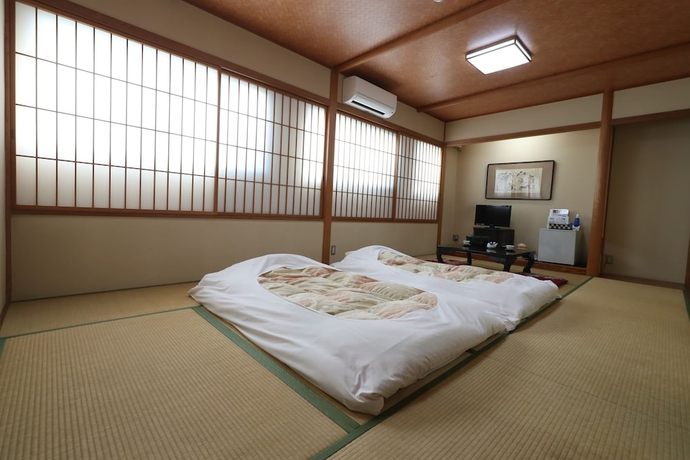 Imagen de la habitación del Hotel New Yama. Foto 7