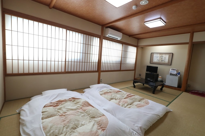 Imagen de la habitación del Hotel New Yama. Foto 8