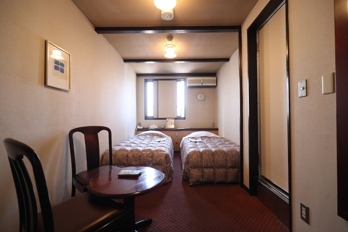 Imagen de la habitación del Hotel New Yama. Foto 14