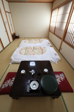 Imagen de la habitación del Hotel New Yama. Foto 16
