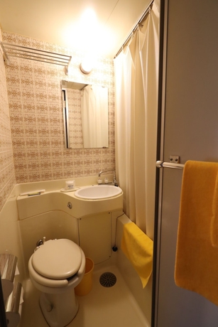 Imagen de la habitación del Hotel New Yama. Foto 17