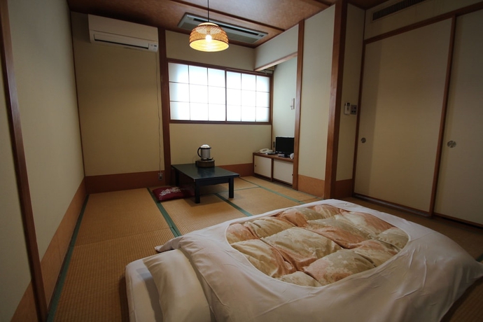Imagen de la habitación del Hotel New Yama. Foto 19