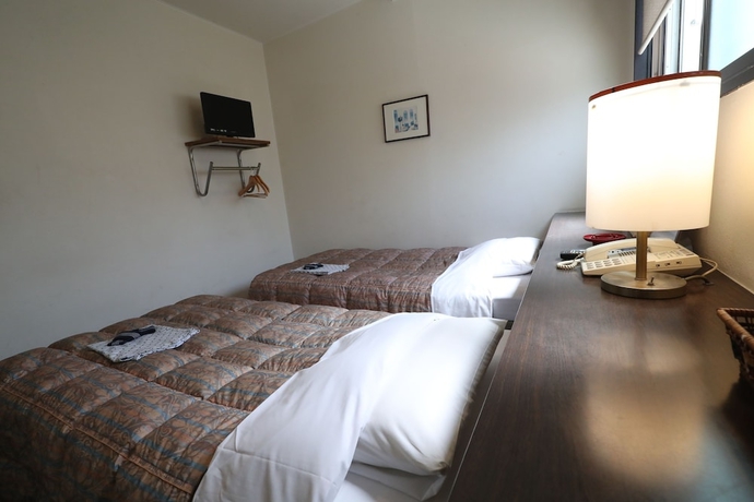 Imagen de la habitación del Hotel New Yama. Foto 26