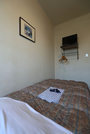 Imagen de la habitación del Hotel New Yama. Foto 29