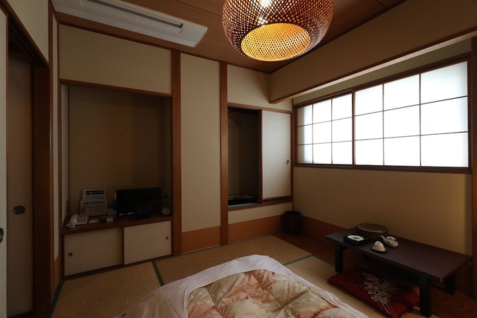 Imagen de la habitación del Hotel New Yama. Foto 31