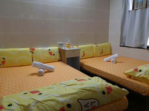Imagen de la habitación del Hotel New Yan Yan Guest House. Foto 13
