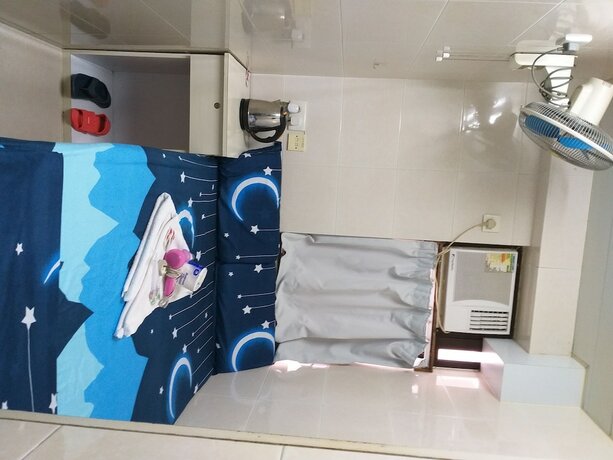 Imagen de la habitación del Hotel New Yan Yan Guest House. Foto 14