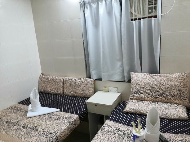 Imagen de la habitación del Hotel New Yan Yan Guest House. Foto 16