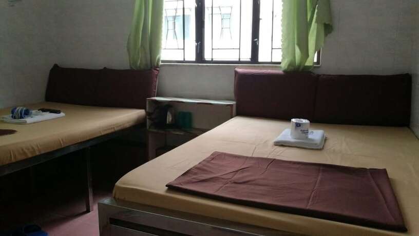 Imagen de la habitación del Hotel New Yan Yan Guest House. Foto 21