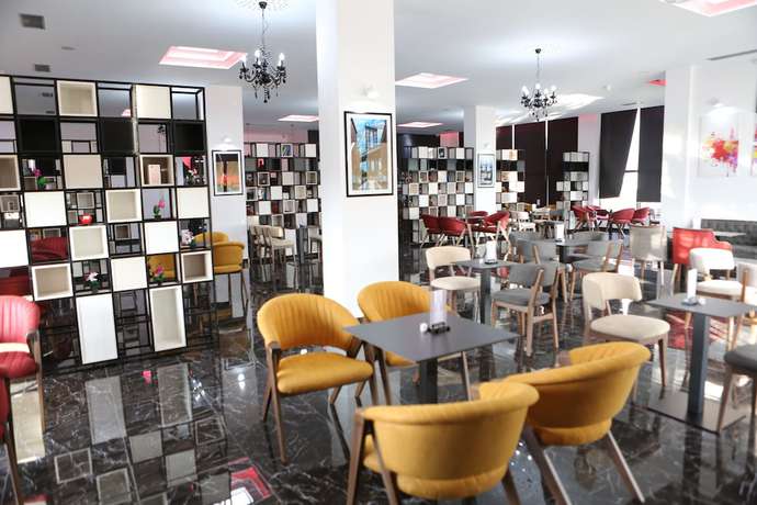 Imagen del bar/restaurante del Hotel New York Kamez. Foto 6