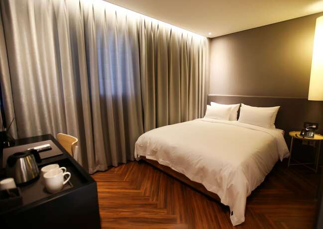 Imagen de la habitación del Hotel NewCZ Gwangan. Foto 14