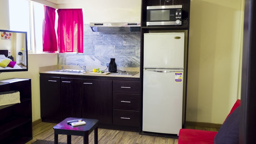 Imagen de la habitación del Hotel Newcity Suites and Apartments. Foto 11