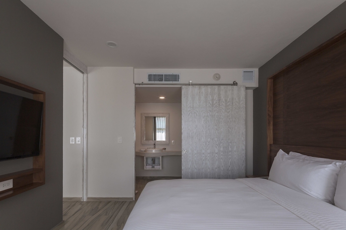 Imagen de la habitación del Hotel Newport House Playa Boutique. Foto 3