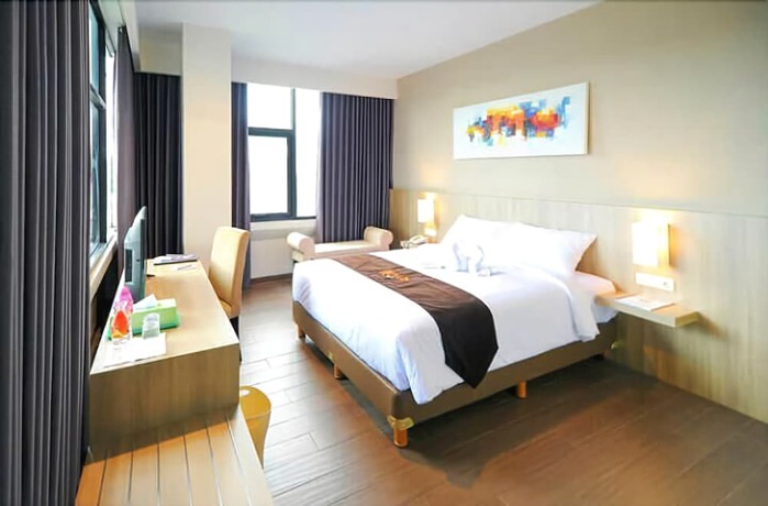Imagen de la habitación del Hotel News Waru Sidoarjo. Foto 4
