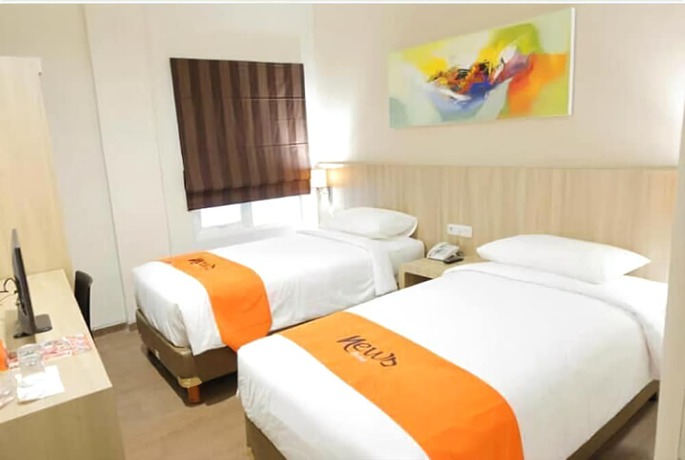Imagen de la habitación del Hotel News Waru Sidoarjo. Foto 5