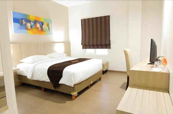 Imagen de la habitación del Hotel News Waru Sidoarjo. Foto 6