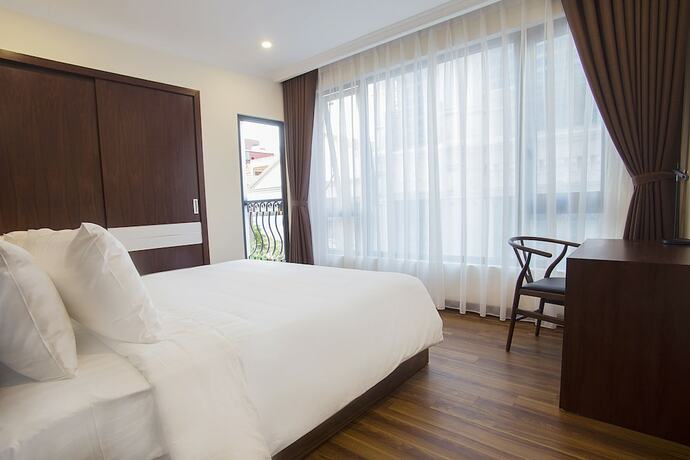 Imagen de la habitación del Hotel Newsky Serviced Apartment. Foto 16