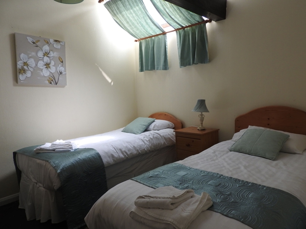 Imagen de la habitación del Hotel Newton House. Foto 11