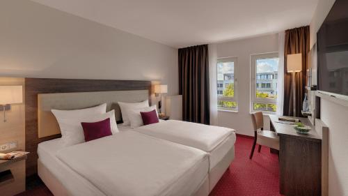 Imagen de la habitación del Hotel Newton Ludwigshafen. Foto 1