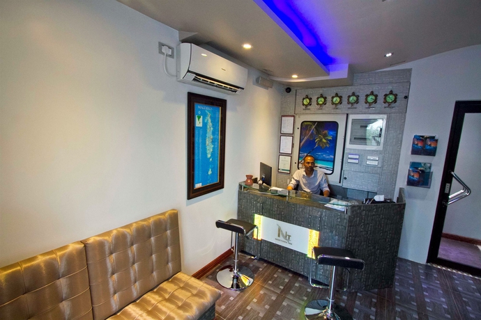 Imagen de los interiores del Hotel Newtown Inn. Foto 12