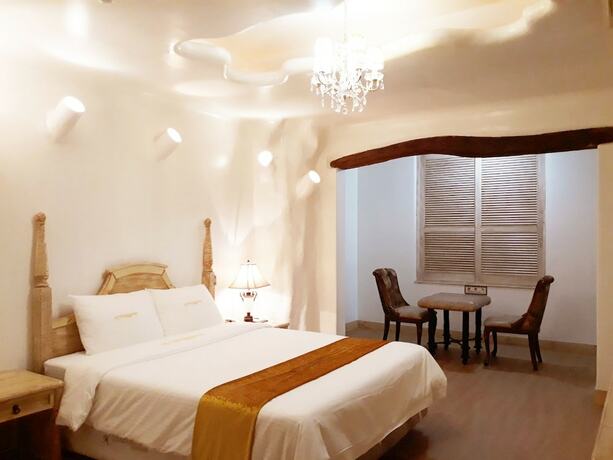 Imagen de la habitación del Hotel Newvera. Foto 19