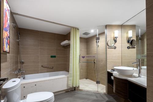 Imagen de la habitación del Hotel Newyantai Hainan. Foto 16