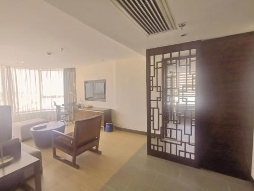 Imagen general del Hotel Newyantai Hainan. Foto 7