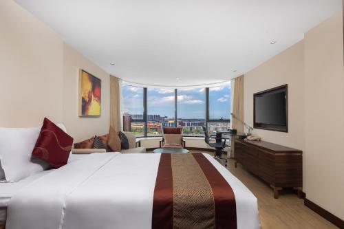 Imagen general del Hotel Newyantai Hainan. Foto 10