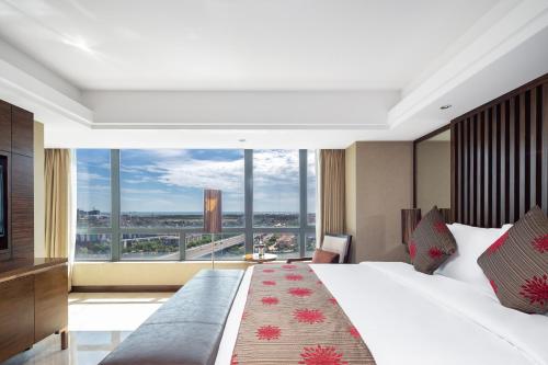 Imagen general del Hotel Newyantai Hainan. Foto 11