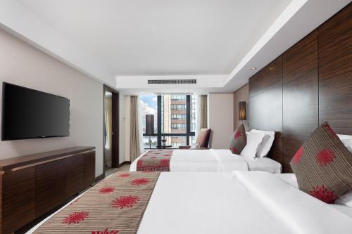Imagen general del Hotel Newyantai Hainan. Foto 13