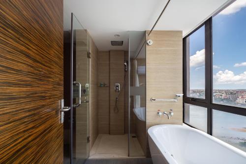 Imagen de la habitación del Hotel Newyantai Hainan. Foto 19