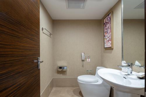 Imagen de la habitación del Hotel Newyantai Hainan. Foto 20