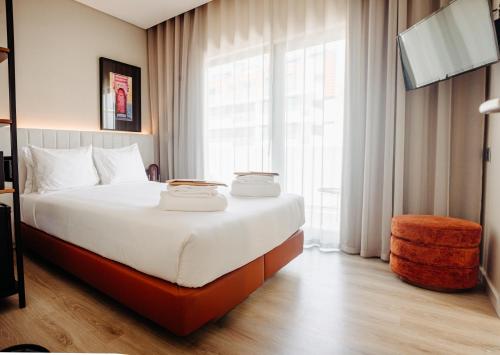 Imagen de la habitación del Hotel Next Level Premium Hotels. Foto 13