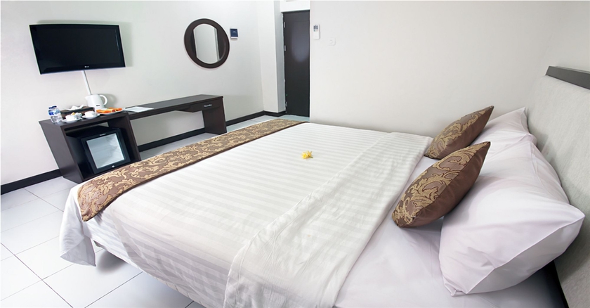 Imagen de la habitación del Hotel Next Tuban Bali. Foto 6