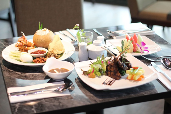 Imagen del bar/restaurante del Hotel Nexus Regency Suites & Hotel. Foto 3