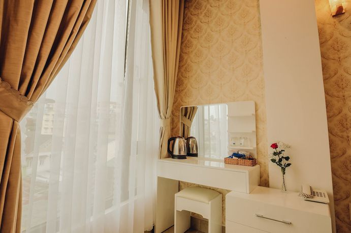 Imagen de la habitación del Hotel Ngan Pho Studio and. Foto 1