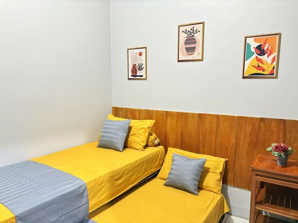Imagen de la habitación del Hotel NgeKost harian. Foto 20
