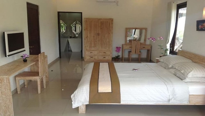 Imagen de la habitación del Hotel Ngeluwungan Boutique Villa. Foto 9