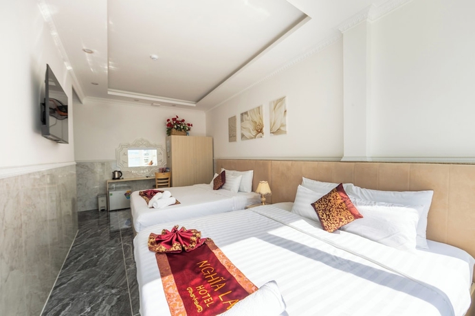 Imagen de la habitación del Hotel Nghia Lan. Foto 5