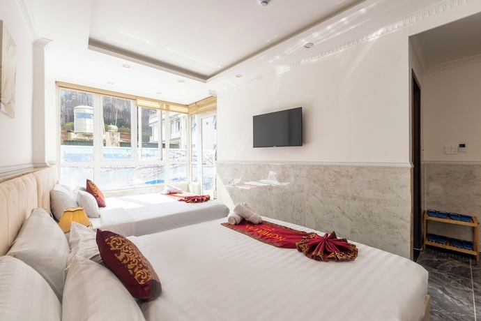 Imagen de la habitación del Hotel Nghia Lan. Foto 6