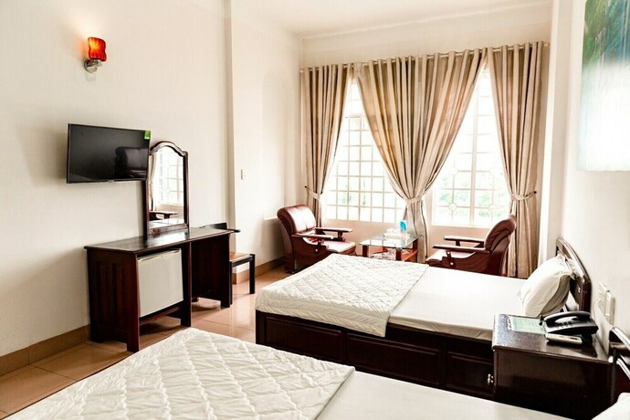 Imagen de la habitación del Hotel Ngoc Han. Foto 24