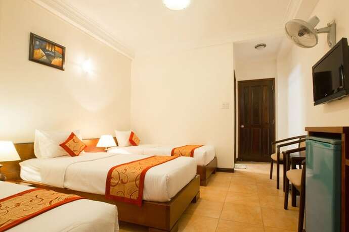 Imagen de la habitación del Hotel Ngoc Minh. Foto 12