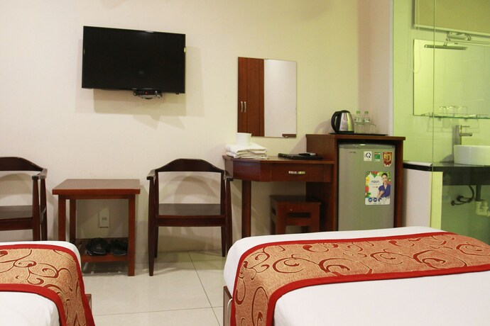 Imagen de la habitación del Hotel Ngoc Minh. Foto 15