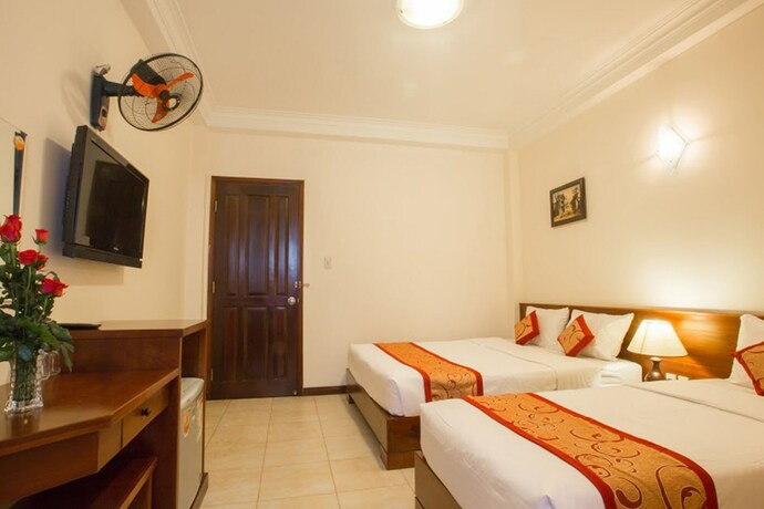 Imagen de la habitación del Hotel Ngoc Minh. Foto 17