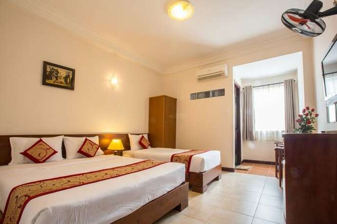 Imagen de la habitación del Hotel Ngoc Minh. Foto 21